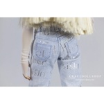 Photo of Джинсы светлые с серебряными надписями (1)