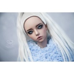 Photo of Свитер св. голубой пушистый с капюшоном